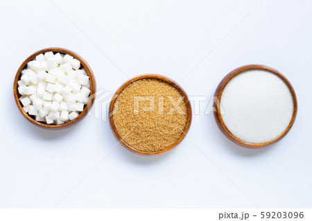 Wooden bowl with sugar on white background. 59203096