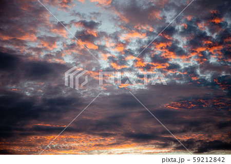Red Sunlight in the Dark and Dramatic Storm Clouds. Red Sunlight in the Dark and Dramatic Storm Clouds. 59212842