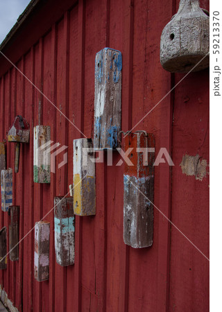Red boat house wall in Rockport harbor 59213370