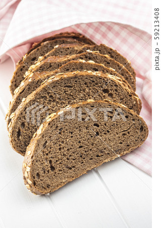 Sliced whole grain bread with oat flakes. Sliced whole grain bread with oat flakes. 59213408