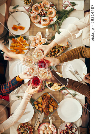 Toasting over Dinner Table Toasting over Dinner Table 59214487