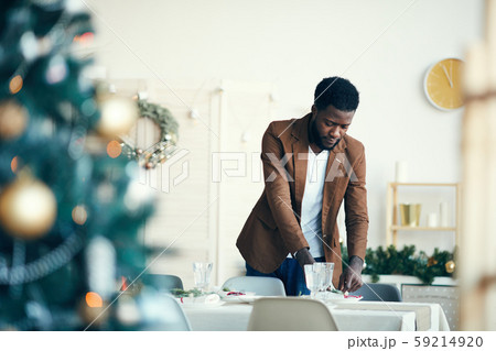 Man Preparing for Christmas Dinner 59214920