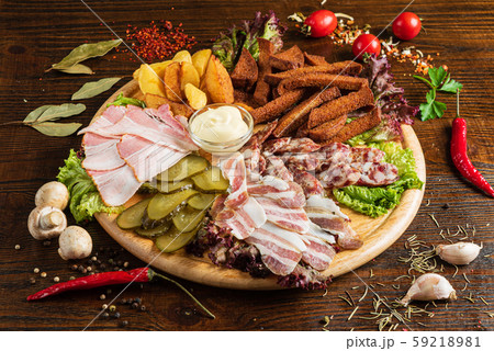 meat appetizers on the wooden background 59218981