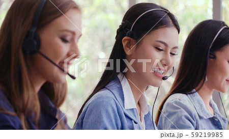Customer support agent or call center with headset 59219985
