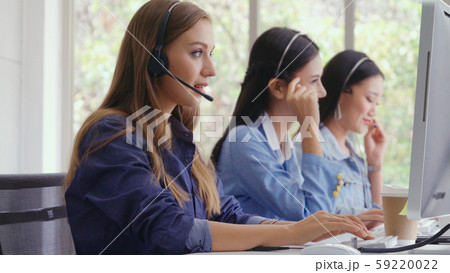 Customer support agent or call center with headset 59220022