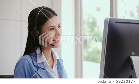 Customer support agent or call center with headset Customer support agent or call center with headset 59220177