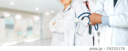 Doctor working in hospital with other doctors. Doctor working in hospital with other doctors. 59220178