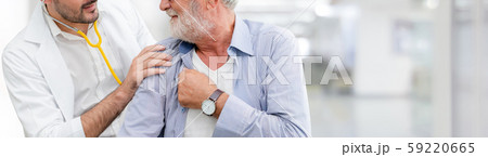 Doctor checking patient health in hospital office. 59220665