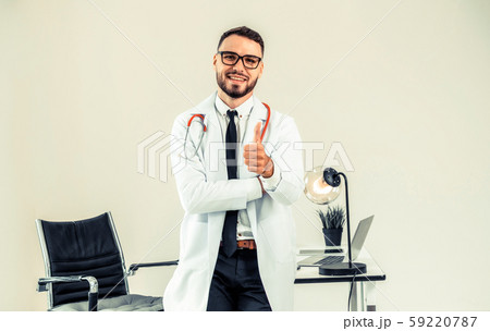 Doctor showing thumbs up in the hospital. 59220787