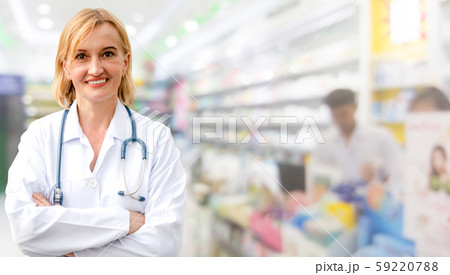 Senior woman pharmacist working in the pharmacy. 59220788