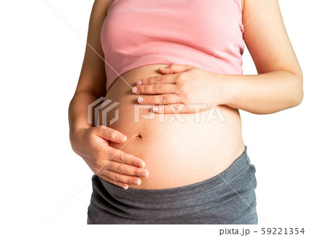 Happy pregnant woman isolated on white background. Happy pregnant woman isolated on white background. 59221354