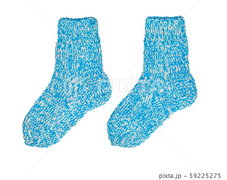 Two blue knitted wool socks on a white isolated background Two blue knitted wool socks on a white isolated background 59225275