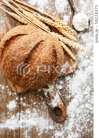 Bread with wheat ears and flour Bread with wheat ears and flour 59228371