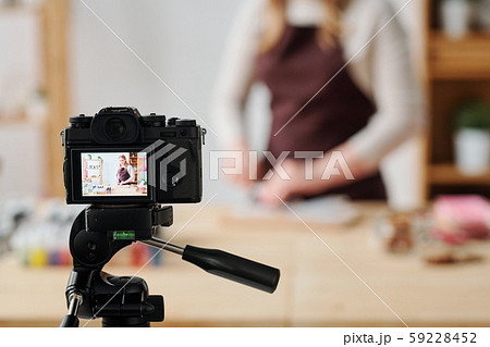 Creative woman in home camera recording soap making master class for subscribers Creative woman in home camera recording soap making master class for subscribers 59228452