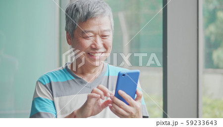old man use smart phone old man use smart phone 59233643