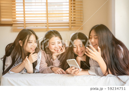 Group of women friend tell scret and laughing Group of women friend tell scret and laughing 59234751