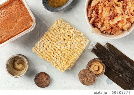 Ramen ingredients. Dried sea vegetable kelp, soba instant noodles, miso paste, tuna flakes, shiitake 59235277