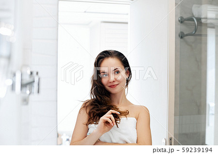 Hair and body care. Woman touching hair and Hair and body care. Woman touching hair and 59239194