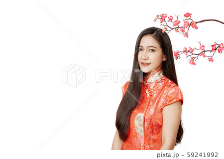 Woman in traditional chinese red dress with plum Woman in traditional chinese red dress with plum 59241992