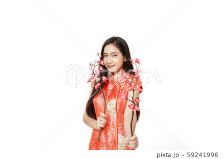 Woman in traditional chinese red dress with plum Woman in traditional chinese red dress with plum 59241996