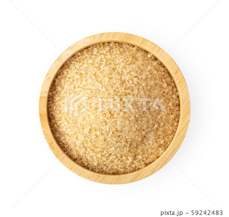 brown cane sugar in wooden bowl isolated on white brown cane sugar in wooden bowl isolated on white 59242483
