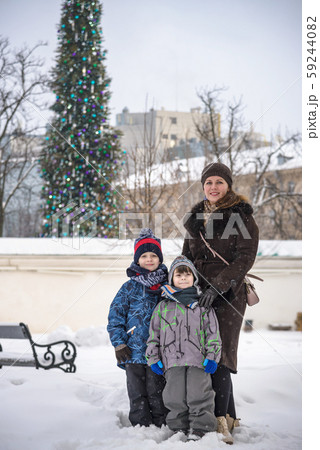 Family portrait of a smiling mother hugging a boy Family portrait of a smiling mother hugging a boy 59244082