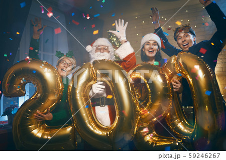 People are having fun and holding numbers 2020. People are having fun and holding numbers 2020. 59246267
