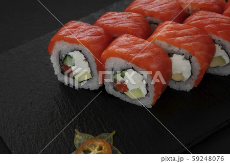 Sushi, rolls, fish dishes. Seafood delicacies 59248076