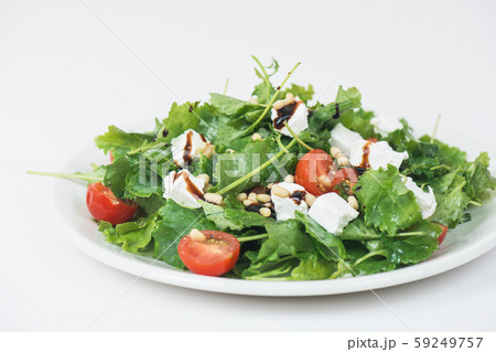 Green salad with vegetables and cheese 59249757