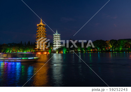 Sun and Moon Pagodas Towers at night 59252243