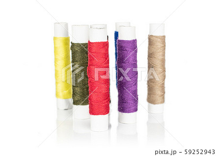 Sewing thread spool isolated on white 59252943
