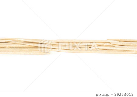 Wooden brown toothpick isolated on white 59253015