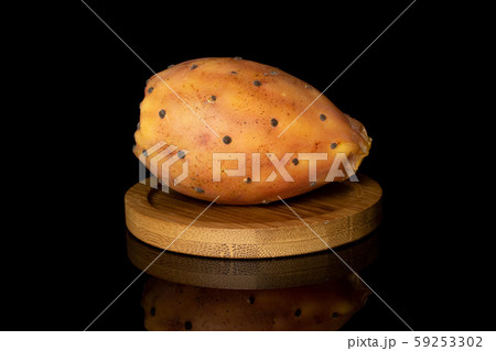 Green prickly pear isolated on black glass Green prickly pear isolated on black glass 59253302
