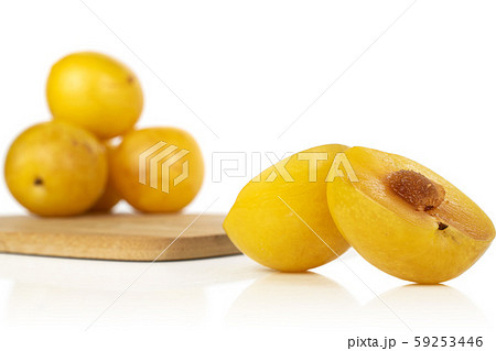 Fresh yellow plum isolated on white Fresh yellow plum isolated on white 59253446