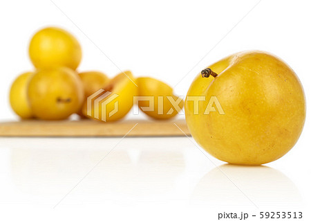 Fresh yellow plum isolated on white Fresh yellow plum isolated on white 59253513