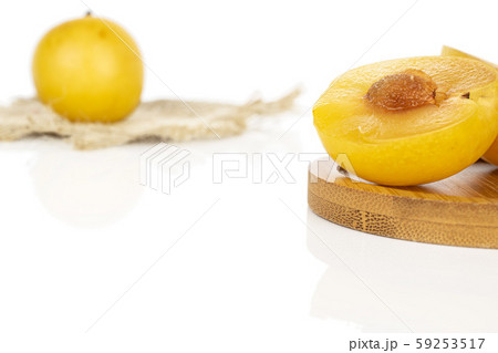 Fresh yellow plum isolated on white Fresh yellow plum isolated on white 59253517