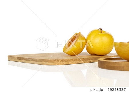 Fresh yellow plum isolated on white Fresh yellow plum isolated on white 59253527