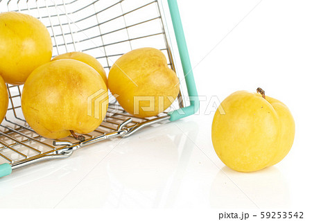 Fresh yellow plum isolated on white Fresh yellow plum isolated on white 59253542
