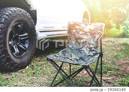 Folding chair on the Camping with Off road pickup Folding chair on the Camping with Off road pickup 59260189
