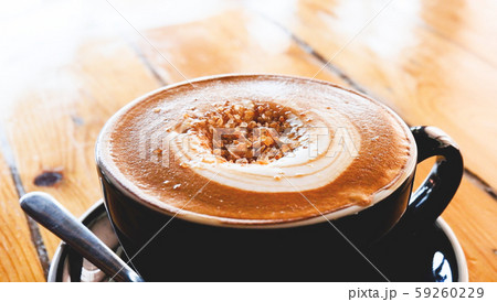 coffee cup on table / cappuccino cup with latte coffee cup on table / cappuccino cup with latte 59260229