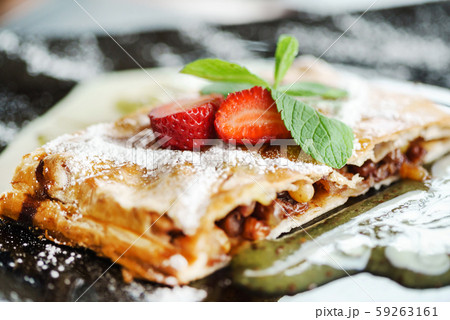 apple strudel with vanilla cream 59263161