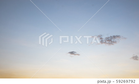 Beautiful view of sky and cloud at dusk,Sky Bright Blue Orange And Yellow Colors in twilight after sunset time. Beautiful view of sky and cloud at dusk,Sky Bright Blue Orange And Yellow Colors in twilight after sunset time. 59269792