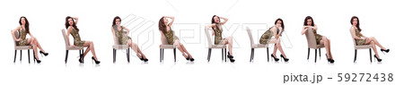 Woman sitting on the chair isolated on white 59272438