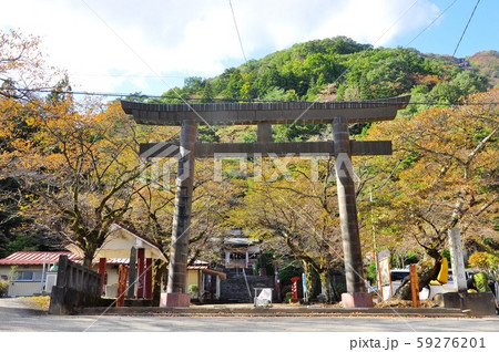 鬼怒川温泉 護国神社鳥居と紅葉の写真素材