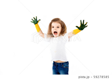 Adorable little girl, modern hair style, white shirt, blue jeans poses, scream, roar, smile. She has 59278585