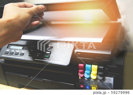 Copier concept - Business man hand open paper on 59279996