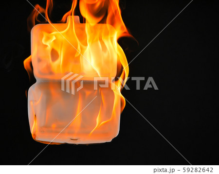 food packing foam box burned on a black background 59282642