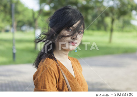 Asian young woman in the park Asian young woman in the park 59283300