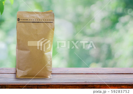 Paper packaging smelling hole, Coffee bean packaging smell the flavor of coffee wafting on wooden 59283752