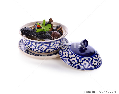 black chicken soup with herbs 59287724